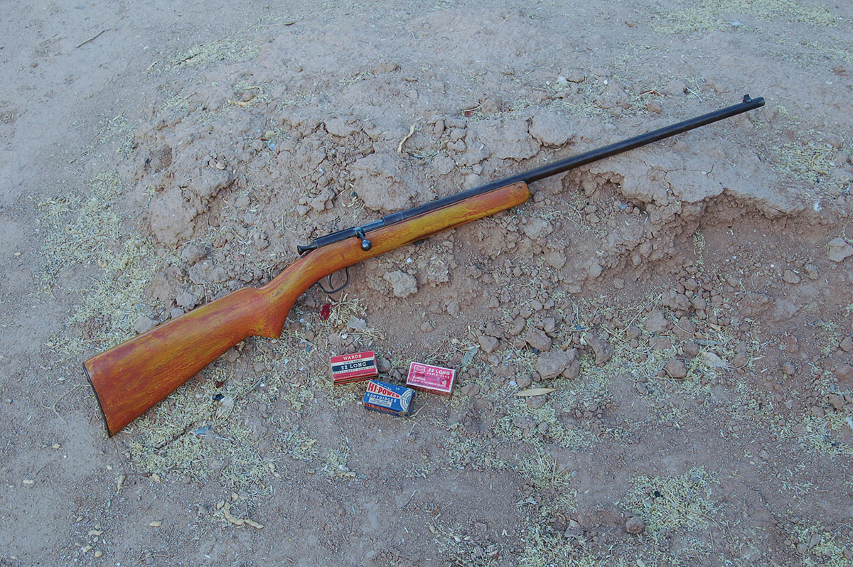 The Iver Johnson Model X Stock is really walnut. The orange color is the last of at least three coats of paint – and no, I have no idea!